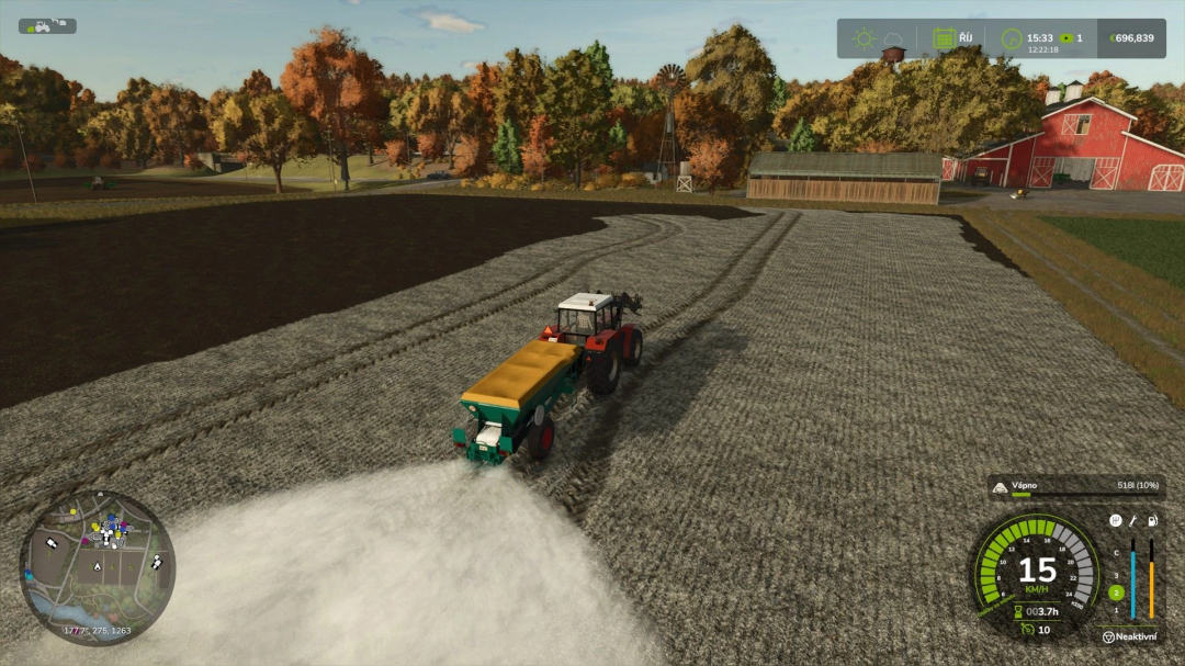 FS25 mod Lizard RCW 5 v1.0.0.0 spreading lime in a field with a tractor, autumn scenery.