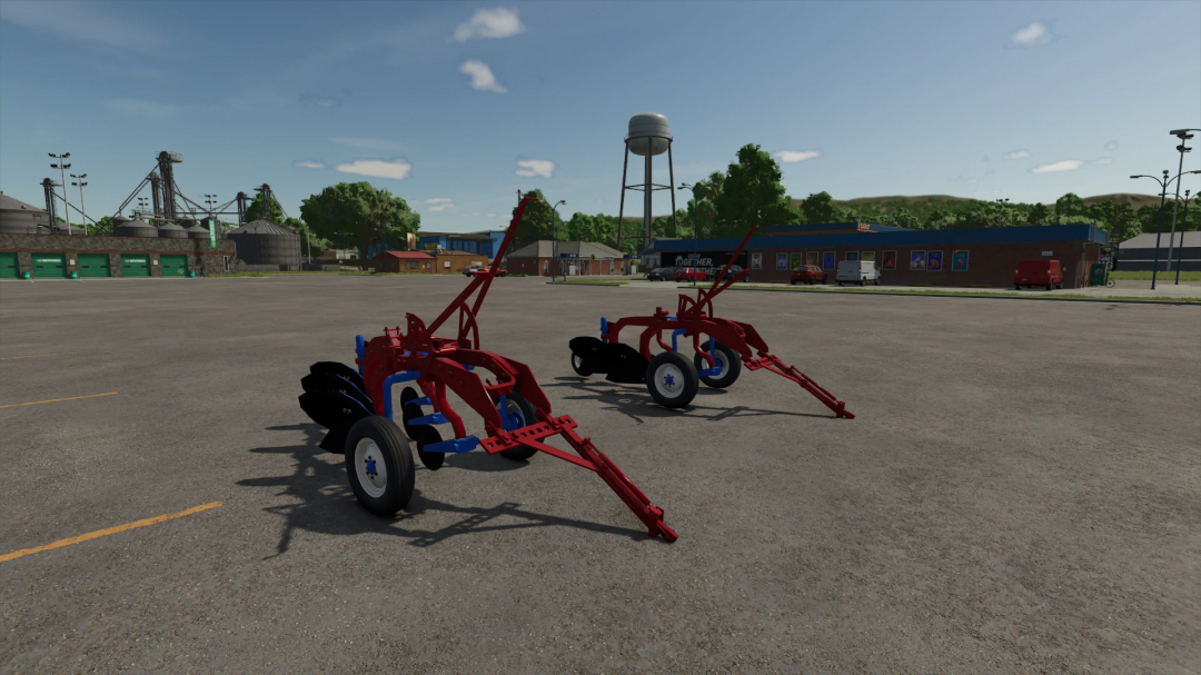 McCormick Deering Little Genius Plows FS25 mod in a parking lot, showcasing red and blue farming equipment.