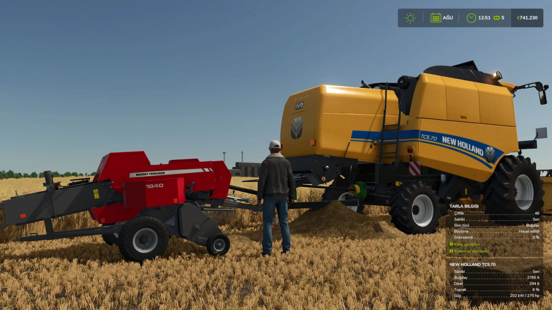 FS25 mods: New Holland TC5 Series v1.0.0.0 harvesting wheat with red Massey Ferguson machine.