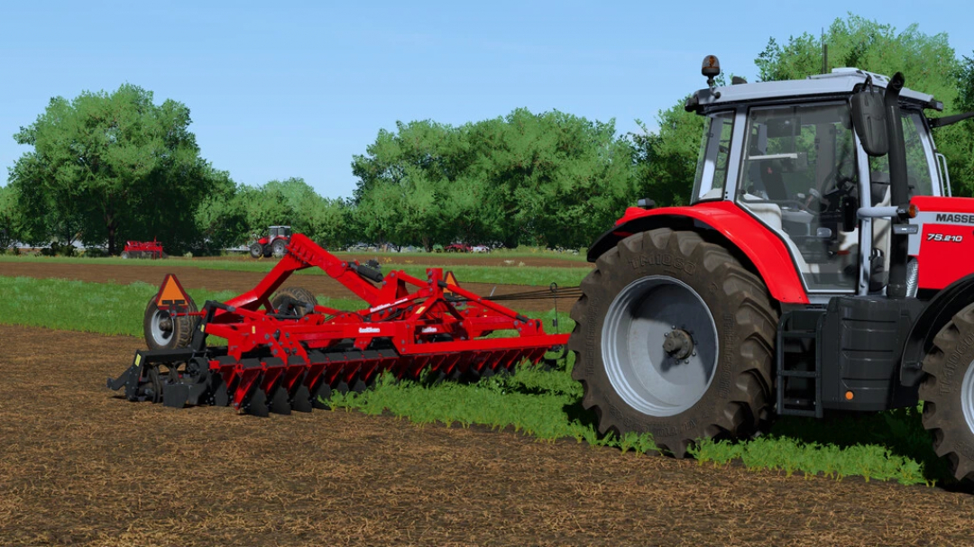 FS22 mod Ozdoken Evodisc Pack v1.0.0.1 with tractor and disc harrow in a field.