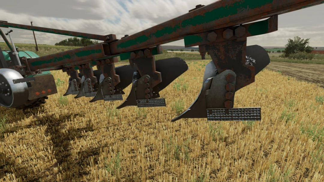 FS22 mod PLN 6-35 plow in a field, Farming Simulator 22 mod showcasing detailed equipment.