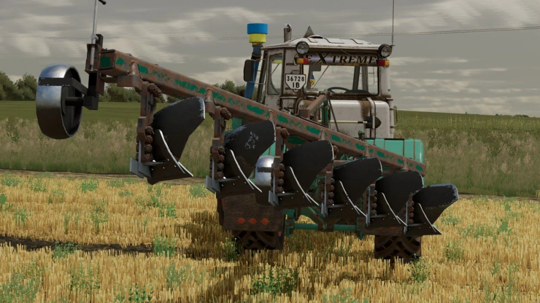 FS22 mod PLN 6-35 v1.0.0.0 plow attached to a tractor in a field, Farming Simulator 22 mods