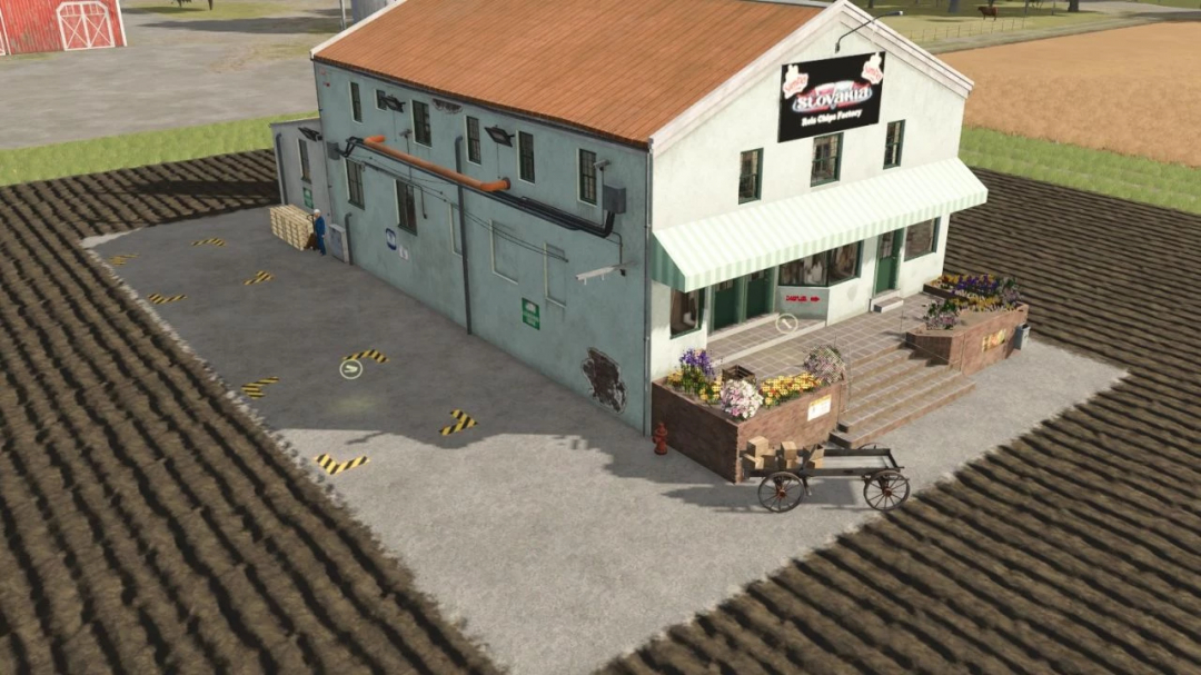 FS25 mod Reis Chips Factory v1.0.0.0 showing a building with a decorative storefront and adjacent farming field.