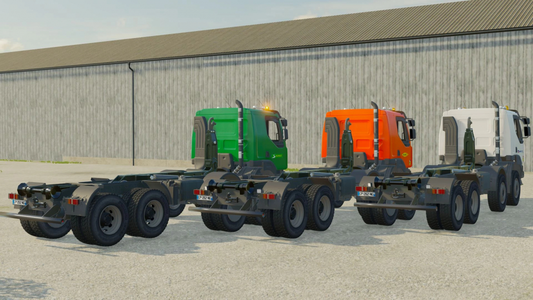 FS22 Renault Kerax Ampiroll v1.1.0.0 mod featuring green, orange, and white trucks in a row.