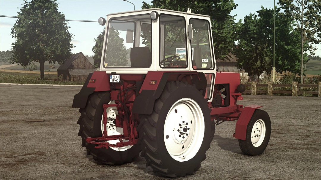 UMZ 6KL tractor mod in Farming Simulator 25, showcasing detailed graphics and rural background.