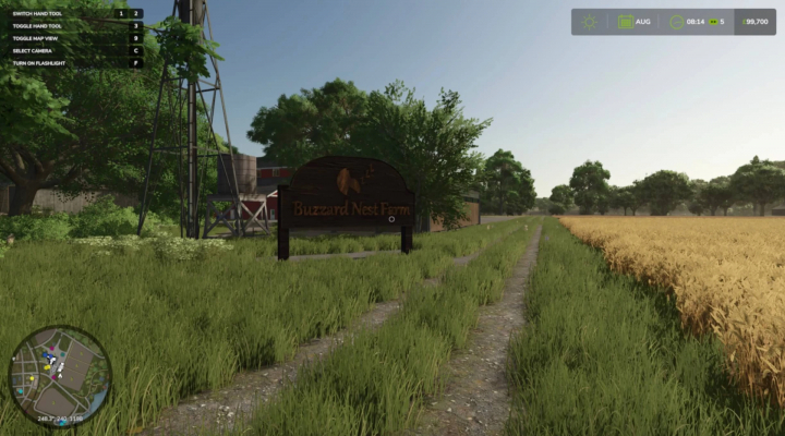 fs25-mods,  Buzzard Nest Farm sign on a grassy path in FS25 mod. Farming Simulator 25 mods create authentic rural scenes.