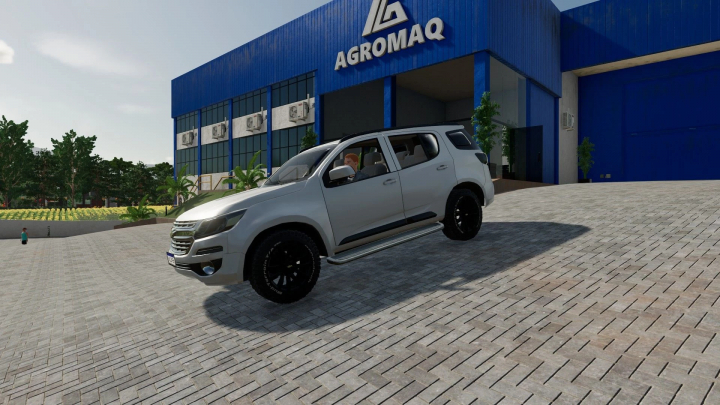 fs22-mods,  Chevrolet Blazer mod in FS22 driving near Agromaq building.