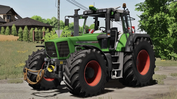 fs25-mods, Fendt Favorit 900 Vario Series tractor mod in FS25 game, showcasing green design with large tires and a rural background.