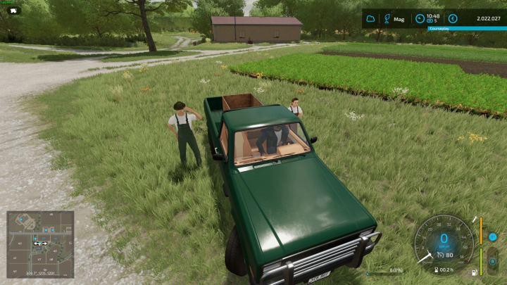 fs22-mods,  FS22 mod Pickup Hand Harvester on a farm with two characters nearby; green farmland setting.