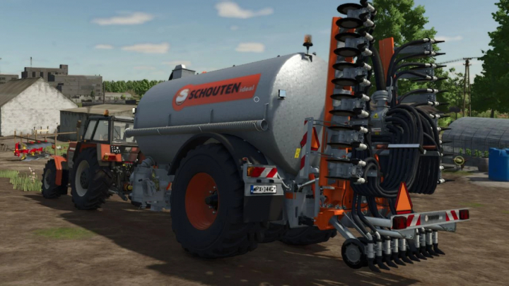 fs25-mods,  Schouten IDEAL/SPIDER Pack mod in FS25 showing a slurry tank attached to a tractor in a farm setting.