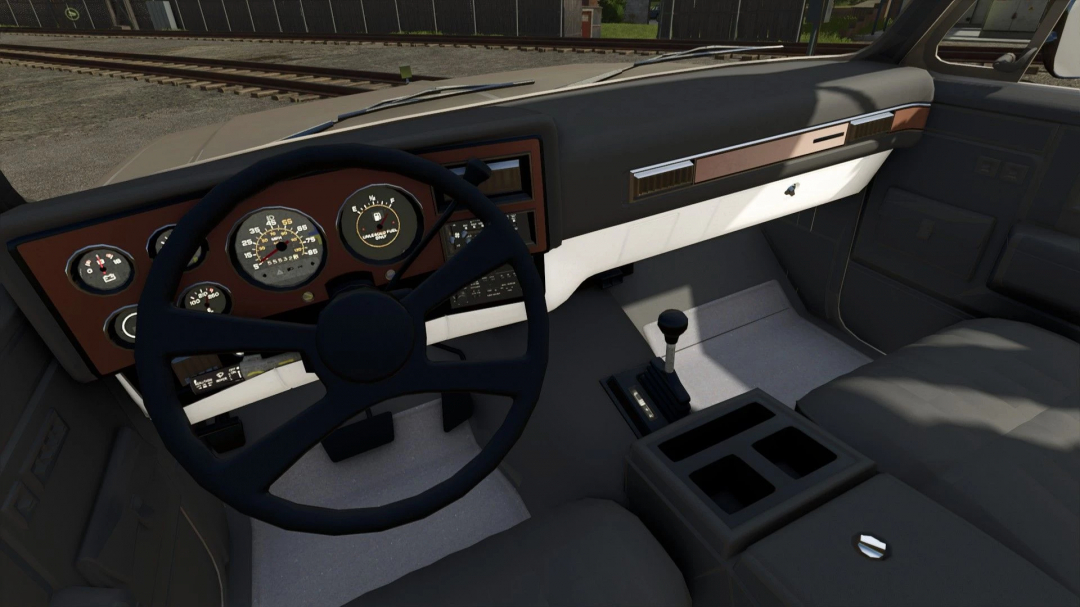 Interior view of 1990 Chevrolet Suburban 4x4 mod in FS25, showing dashboard and steering wheel details.