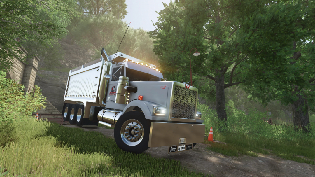 1990 Western Star 4964 Tri-Axle mod in FS25 game, set in a lush forest environment. FS25 mods enhance Farming Simulator 25 experience.