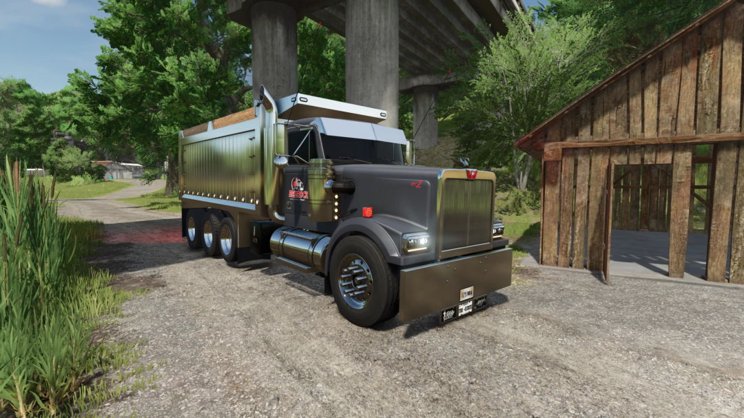 1990 Western Star 4964 Tri-Axle mod in FS25 near a barn on a sunny day, showcasing detailed truck design.