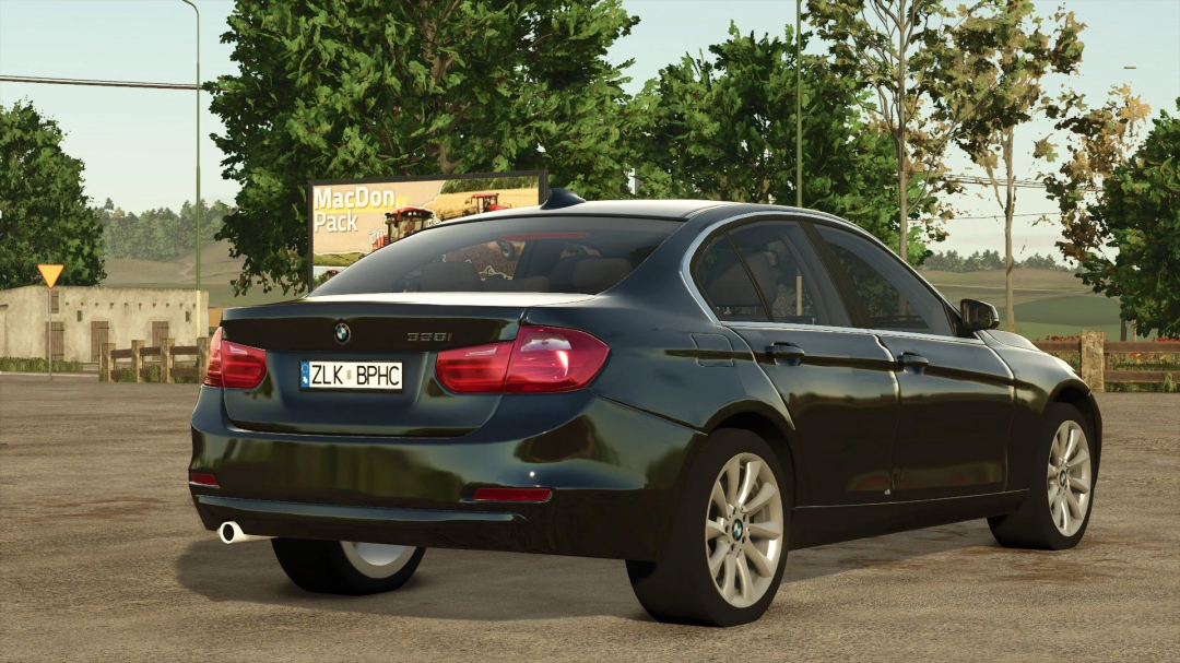 BMW 328i car mod for Farming Simulator 25, black sedan parked outdoors with scenery. FS25 mods showcase.