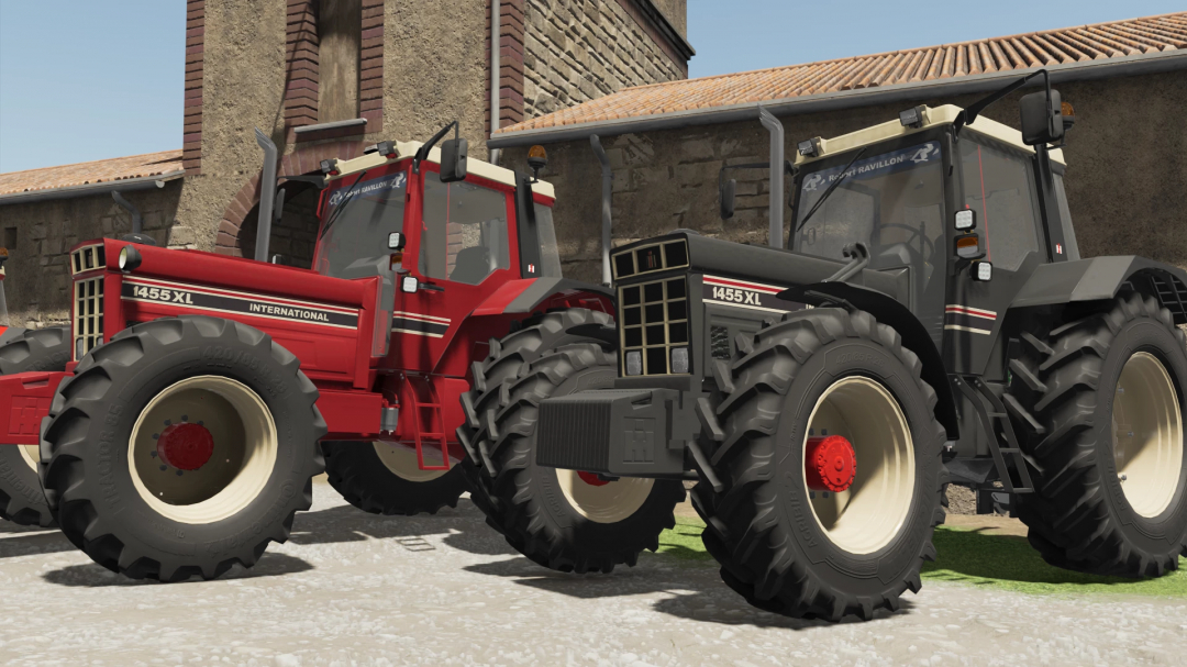 FS22 mods International 1455XL tractors parked outside a barn in Farming Simulator 22 mod.