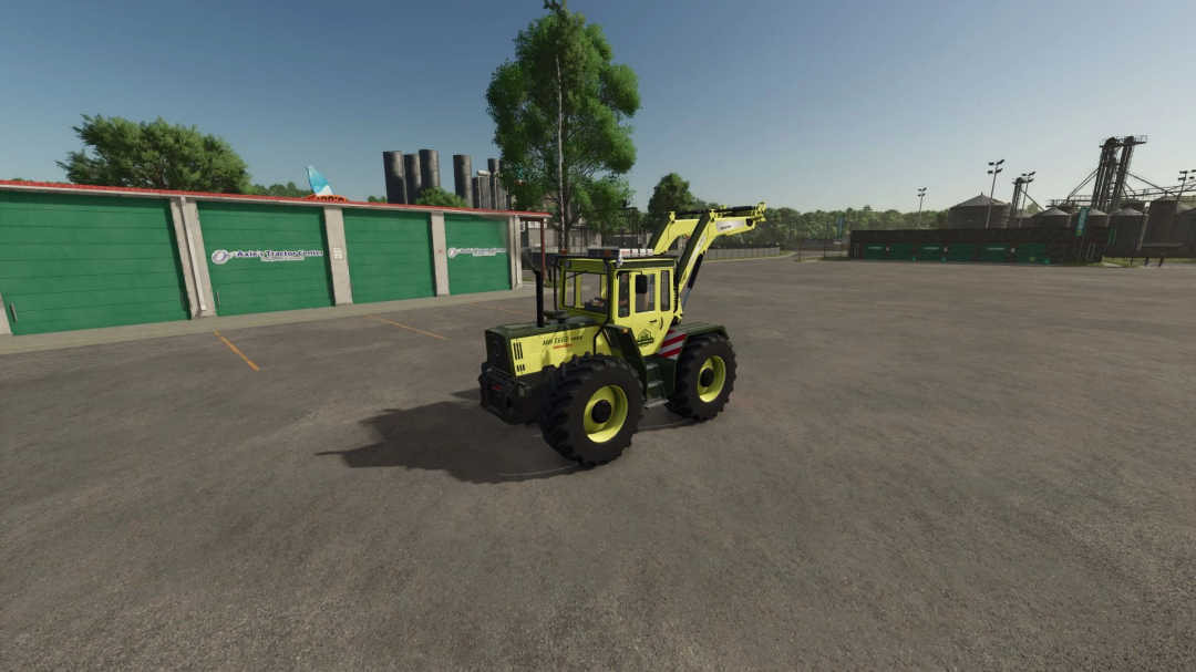 MB Trac Edition tractor mod in FS25, parked next to green tractor center with open yard.