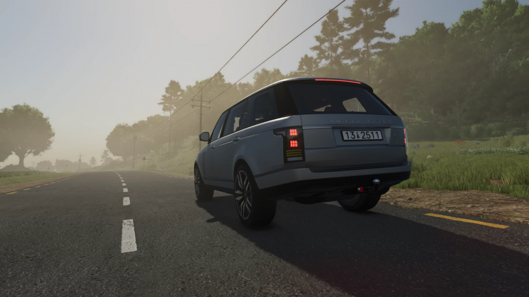 Range Rover LWB mod driving on a rural road in FS25, showcasing Farming Simulator 25 mods.