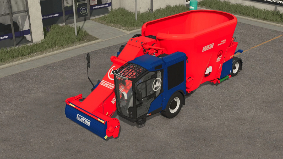 Siloking Selfline 4.0 Premium mod in FS25, featuring a red and blue agricultural vehicle parked outside a building.