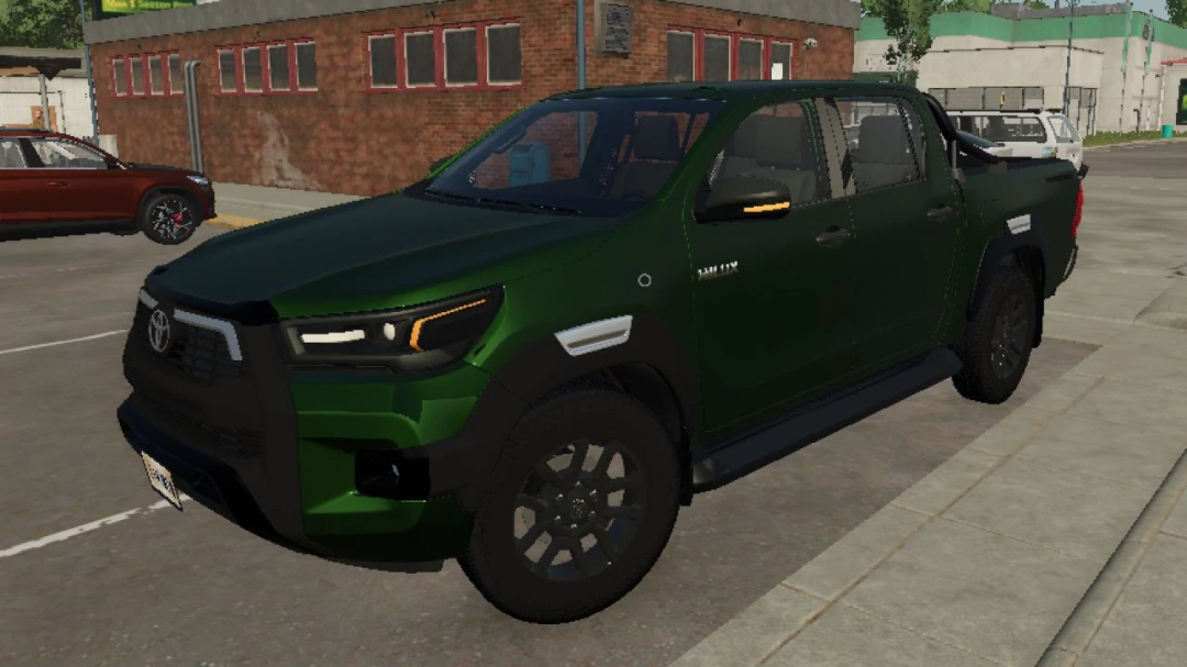 Toyota Hilux 2022 v1.0.0.0 mod in FS25, showcasing a green pickup truck model in Farming Simulator 25.