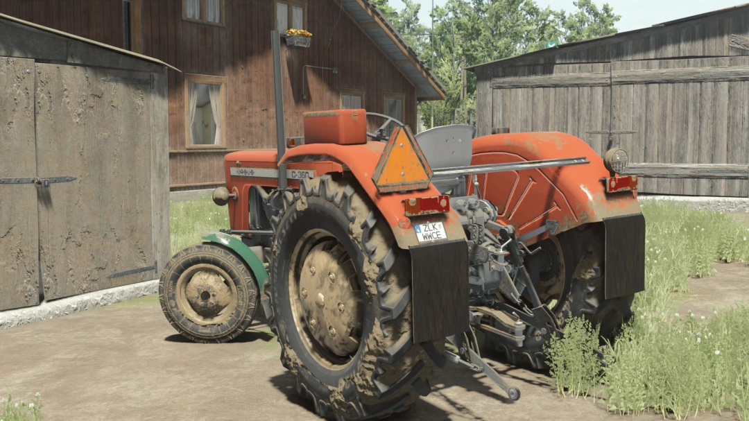 FS25 mods: Ursus C360 tractor parked at farm in Farming Simulator 25.