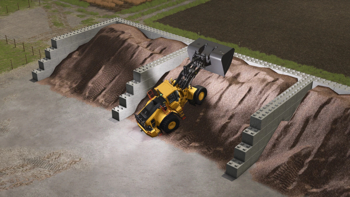 fs25-mods,  A yellow loader working in a bulk material bunker in FS25 mod Farming Simulator 25.