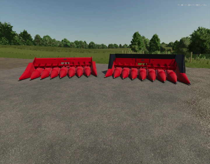 fs25-mods,  FS25 CASEIH 1000 Series Cornheads mod showcasing two red corn headers on a farm in Farming Simulator 25.