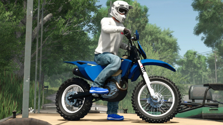 fs25-mods,  Rider on a blue Husqvarna FE 501 motorcycle mod in FS25, surrounded by trees.