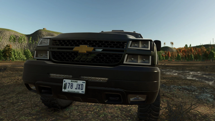 fs25-mods,  Front view of a truck with a Maine Pine Tree license plate mod in Farming Simulator 25.