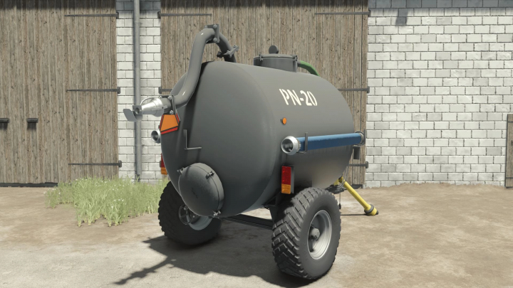 fs25-mods, Meprozet PN20 mod for FS25, showing a gray slurry tank trailer parked in front of a barn.