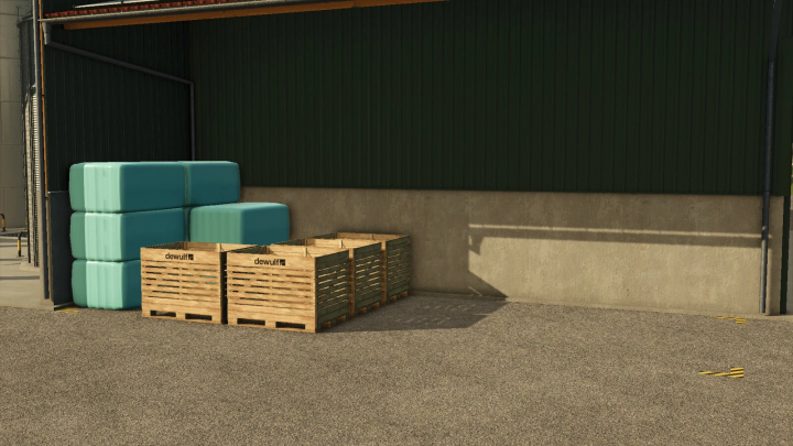 fs25-mods, FS25 mod Multi-fruit Farm Storage v1.0.0.0 showing stacked plastic bales and wooden crates near a green warehouse.