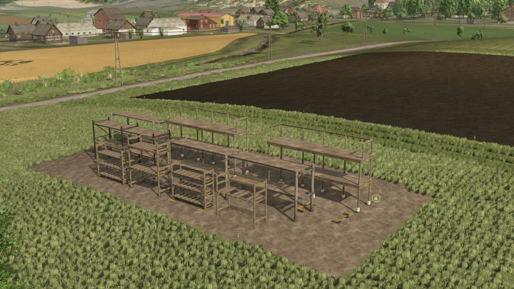 fs25-mods,  Pallet storage racks in a field, part of FS25 mods for Farming Simulator 25.