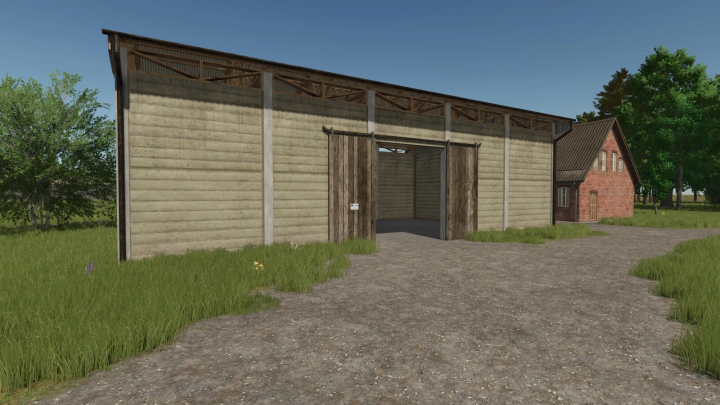 fs25-mods,  Salvage hall from FS25 mods, featuring a wooden structure with open doors in a grassy area.