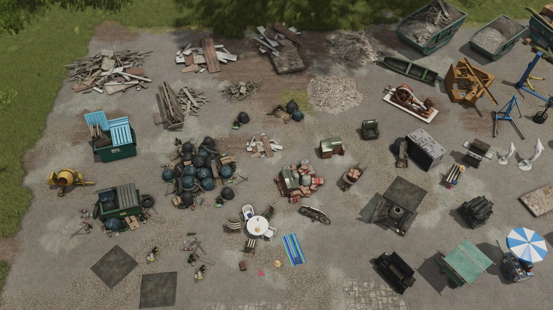 Overhead view of FS25 Additional Decoration Package v1.0.0.0, displaying various construction and decor items on gravel.