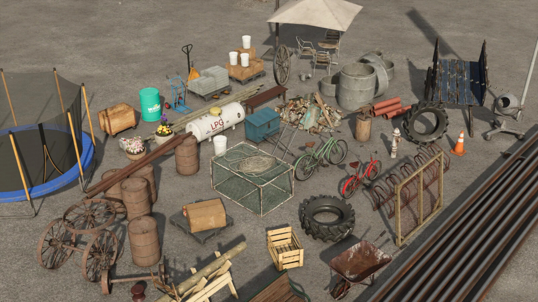 Farming Simulator 25 Big Decoration Package v1.0.0.0 mod featuring assorted farm items like barrels, bicycles, tanks, and more.