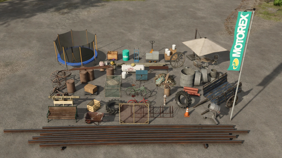 FS25 Big Decoration Package v1.0.0.0 showing various farming items including barrels, pipes, and decorative objects.