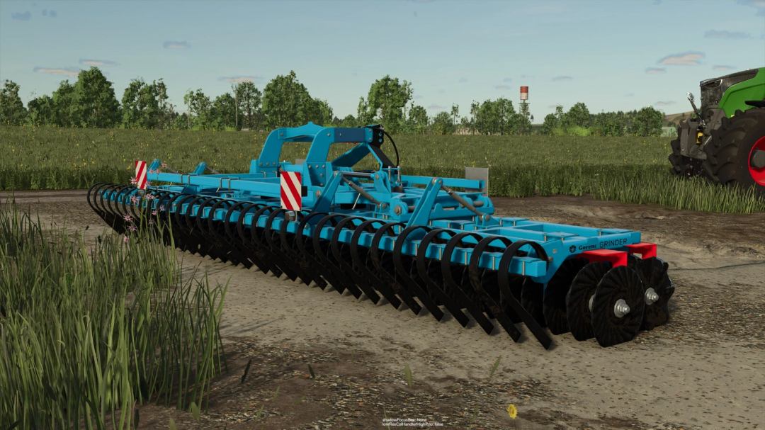 FS25 mod Gorenc Grinder 600 v1.0.0.0 in a field, showcasing its sturdy, blue design in Farming Simulator 25.