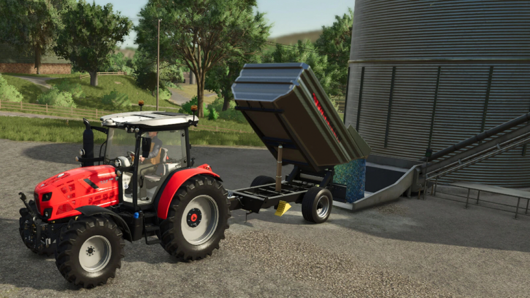 FS25 mod Grape Silo v1.0.0.0 showing a red tractor unloading grapes into a large silo.