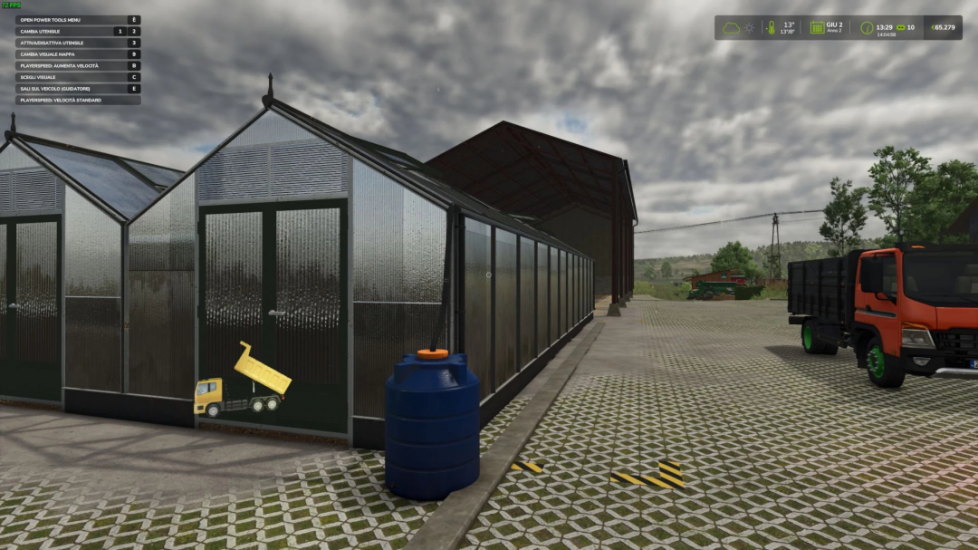 Greenhouse Pack mod in FS25, featuring a greenhouse, a blue barrel, and a truck on a paved area under a cloudy sky.