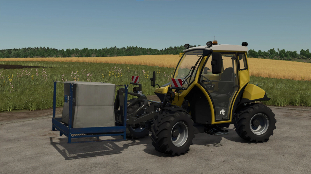 FS25 mod Homemade Pallet Forks v1.0.0.0 showing a yellow vehicle lifting a pallet in a field landscape.