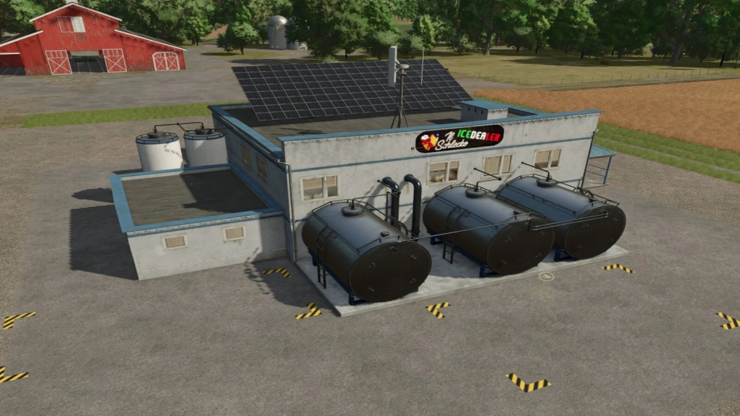 FS25 mod Icecream Factory v1.0.0.0 featuring industrial tanks and solar panels, placed next to a barn in Farming Simulator 25.