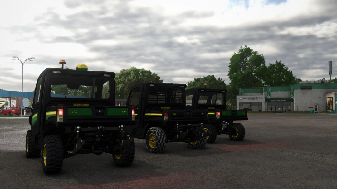 Three John Deere XUV865M Forestry vehicles in FS25 mod, parked in a yard with a cloudy sky.