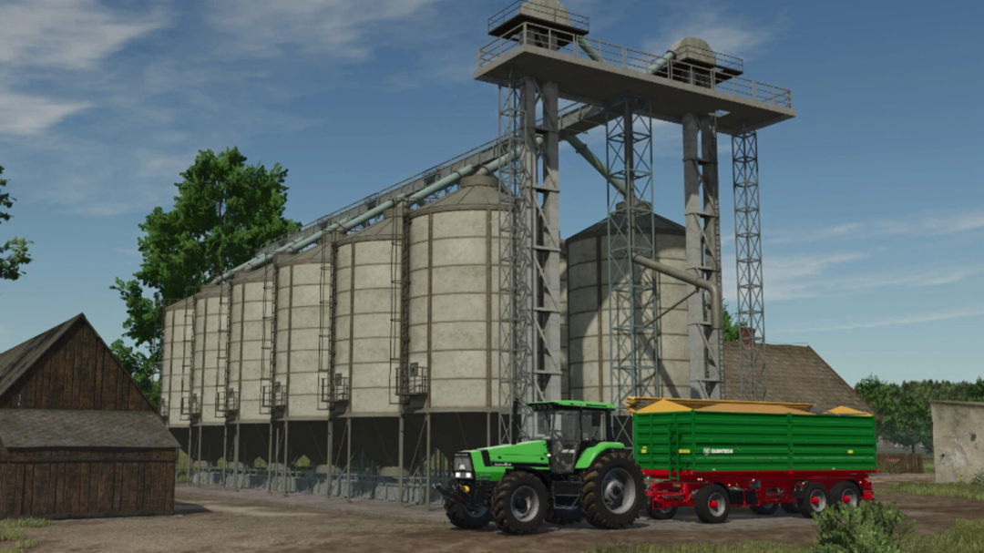 FS25 Large Silo Pack mod with tractor and trailer beside industrial silos.