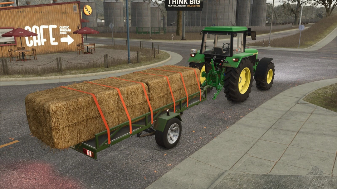 FS25 mod: Lizard Self-Made Trailer v1.0.0.0 carrying hay bales behind a green tractor in Farming Simulator 25.