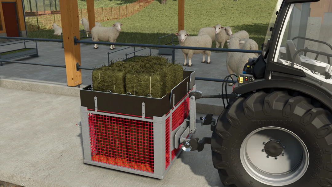 FS25 mod Lizard Transport Box v1.0.0.0 with hay bales attached to tractor, sheep in background.