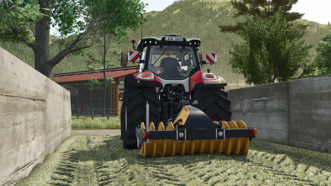 Tractor using Mammut Silo Compaction Pack in FS25 mod for Farming Simulator 25, compacting silage between concrete walls.