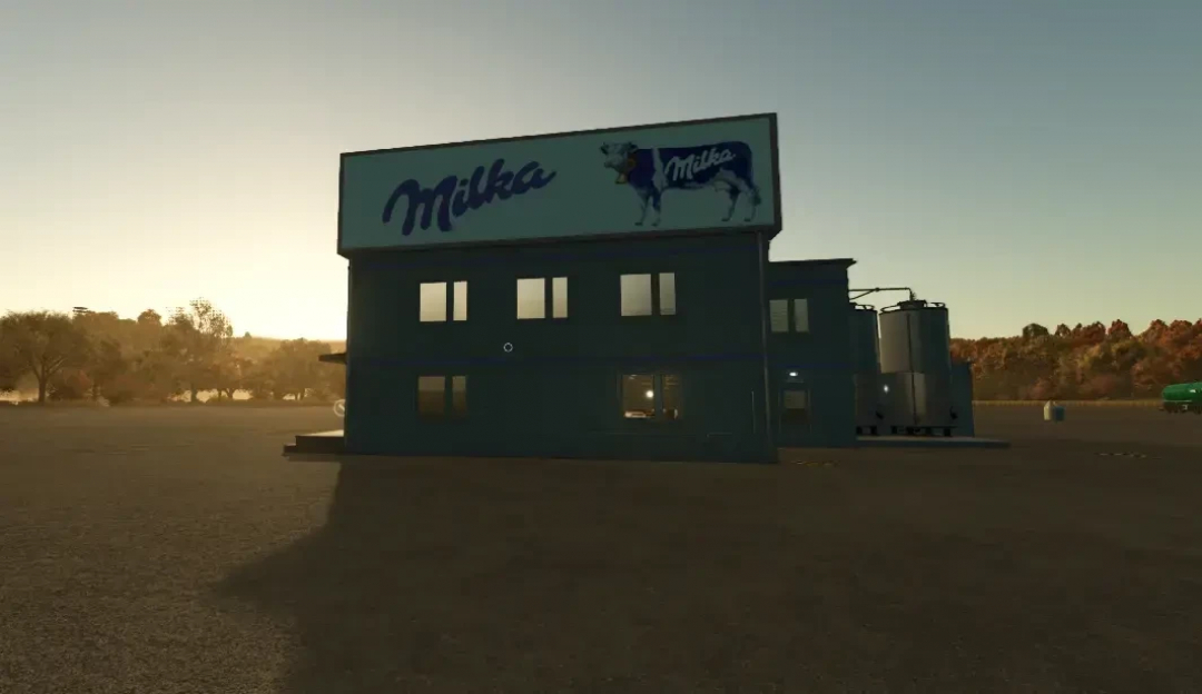 FS25 mod Milka produktion v1.0.0.0 showing a factory building with Milka branding at sunset.