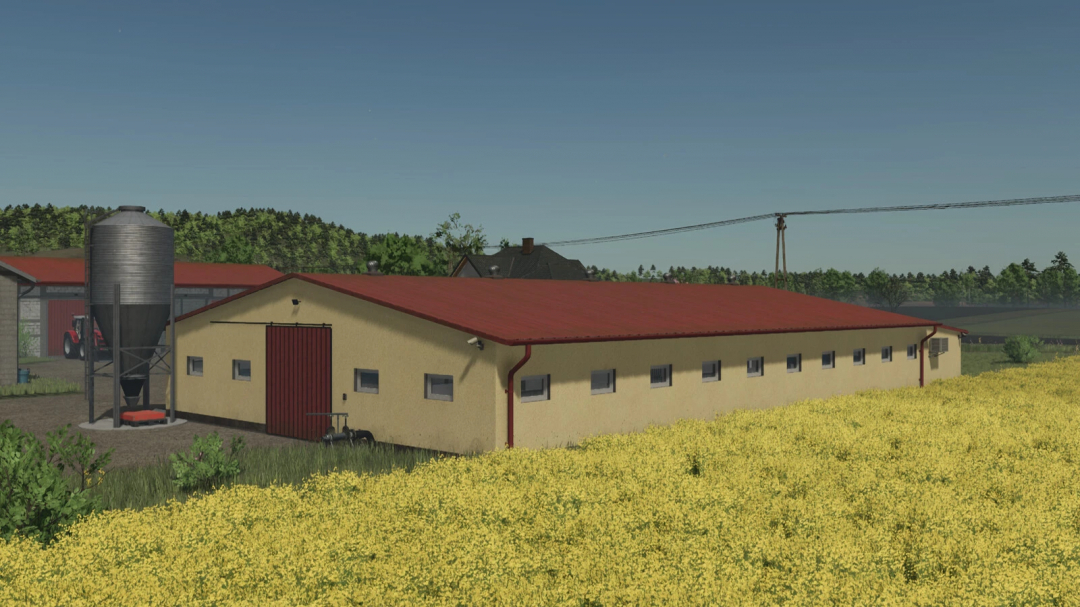 Modern Pigsty mod in FS25 features a red-roofed pig barn with a silo next to a yellow field, enhancing Farming Simulator 25 with realism.