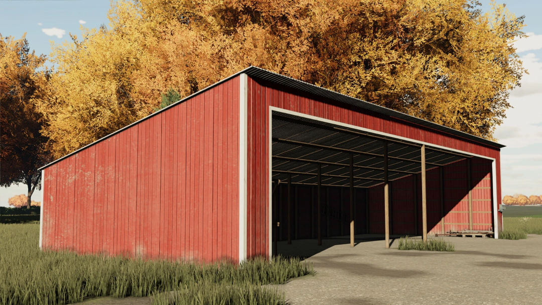 Red barn from Old Skool Pack mod for FS22 set against autumn trees.