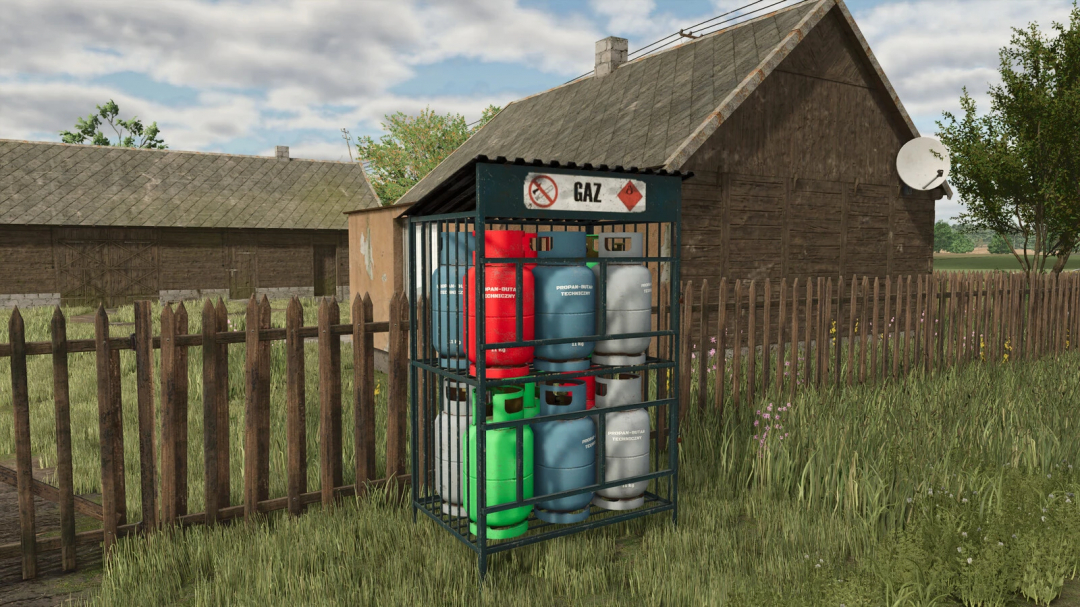 Gas cylinders in a cage next to a fence in Farming Simulator 25 mod: Package Of Small Items v1.0.0.0.