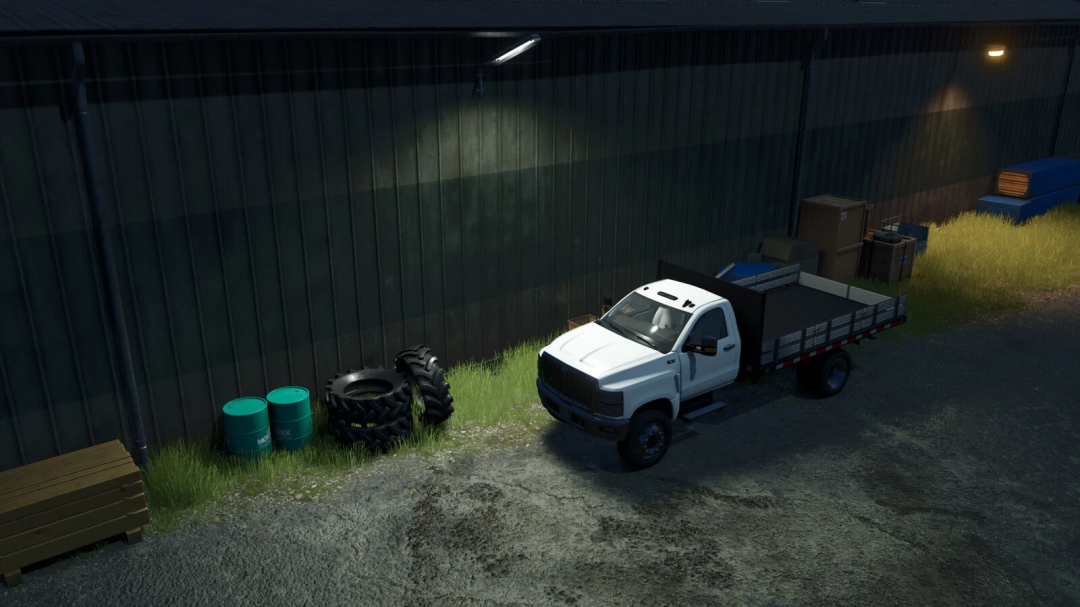 FS25 mods Placeable Wall Lights v1.0.0.0 illuminating a white truck and supplies in Farming Simulator 25.